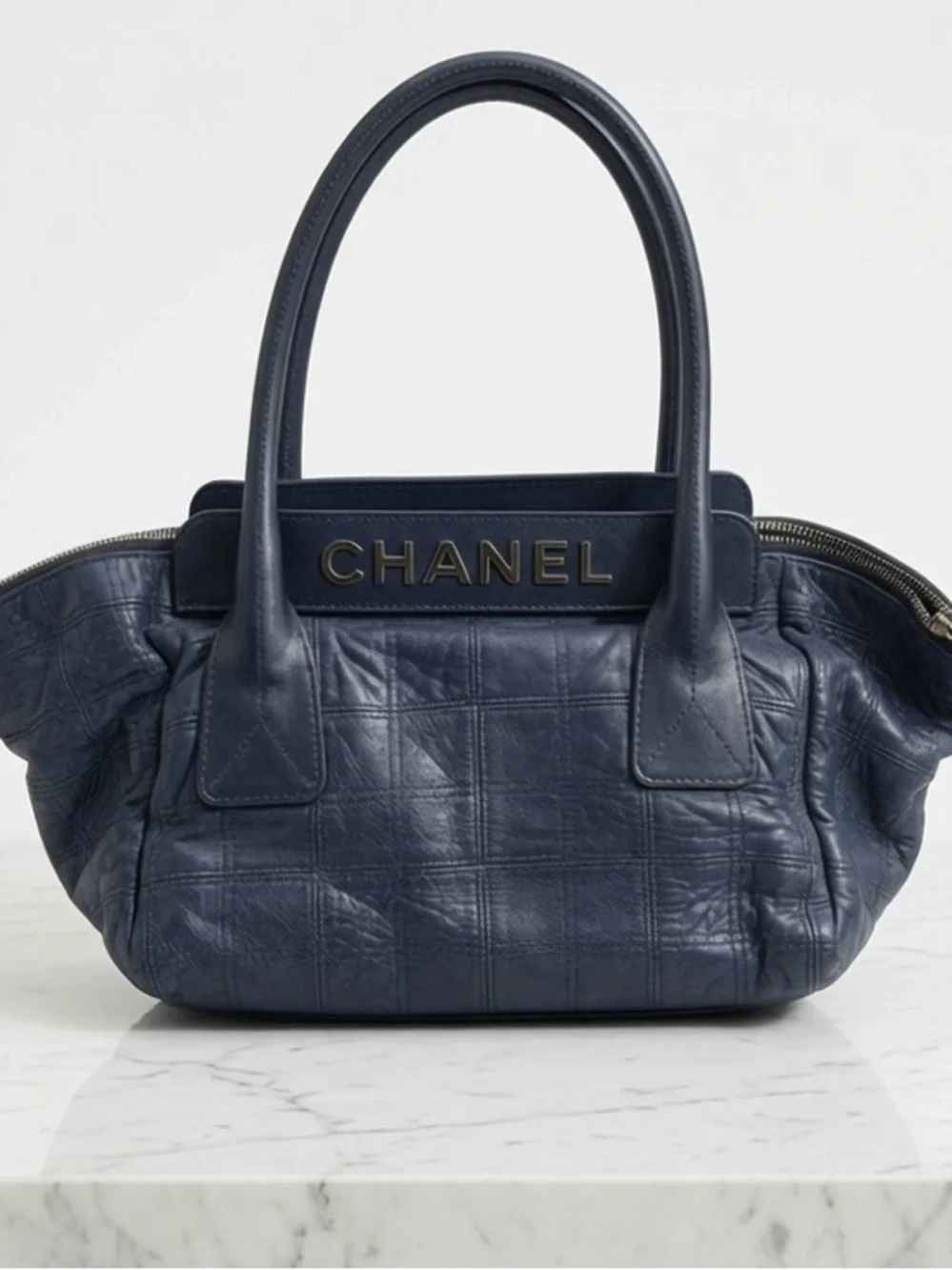 CHANEL Blue Quilted Leather Tote with Logo Plaque
